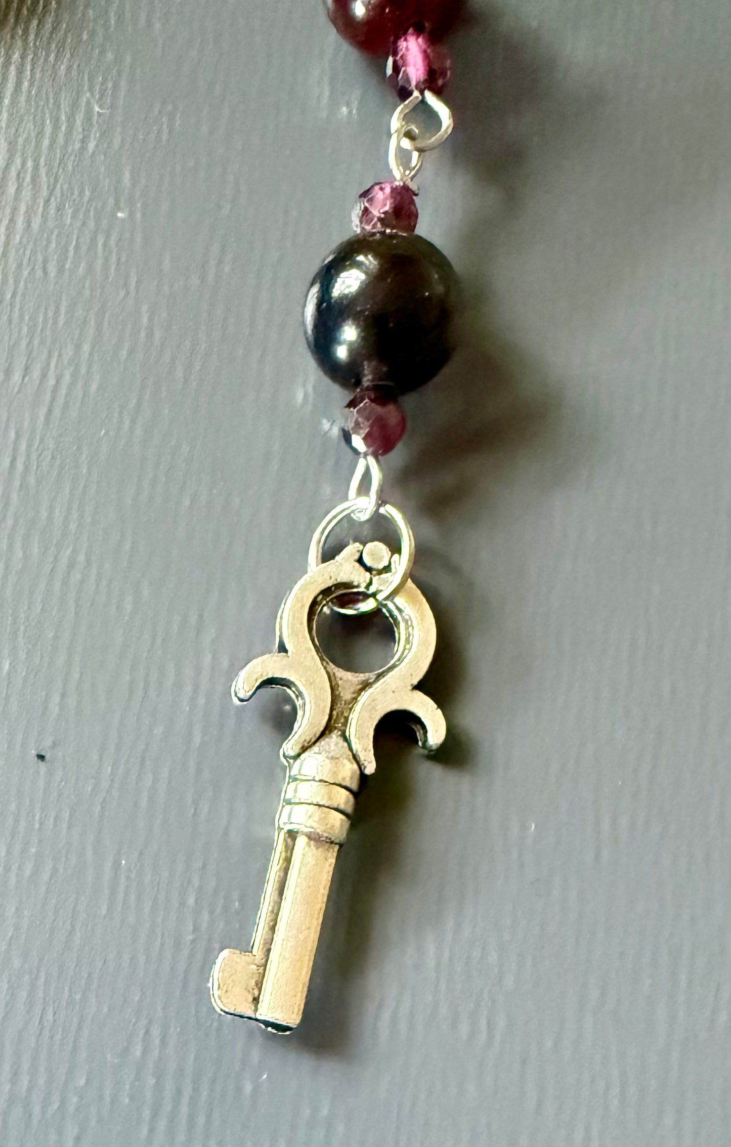 Handmade Garnet Point Pendulum with Obsidian and Garnet Beads.