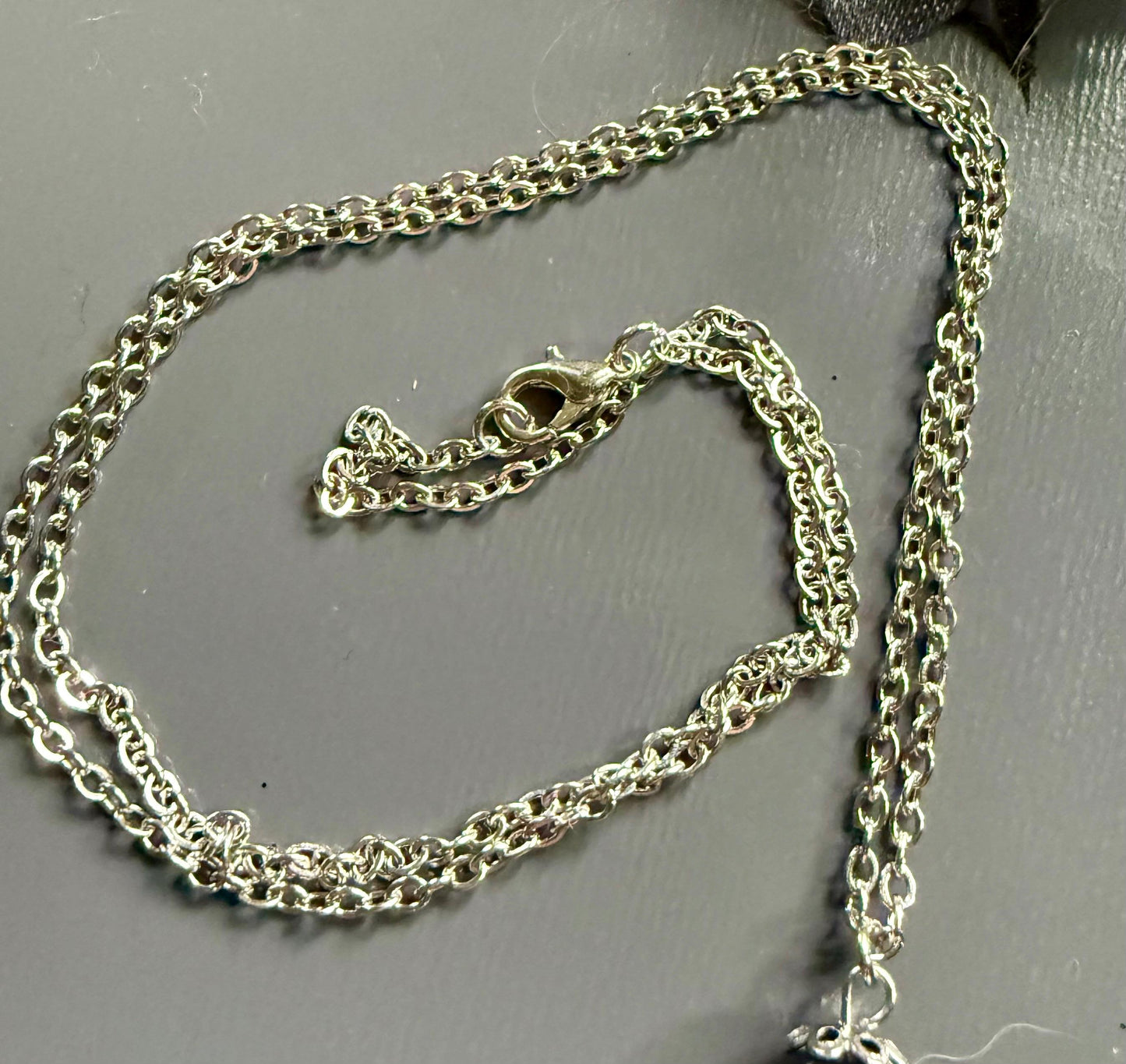 Goddess Hekate’s Wheel Pendant Necklace with Obsidian and Moonstone.