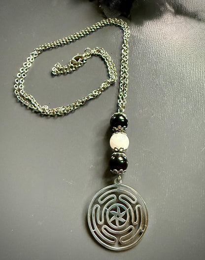 Goddess Hekate’s Wheel Pendant Necklace with Obsidian and Moonstone.