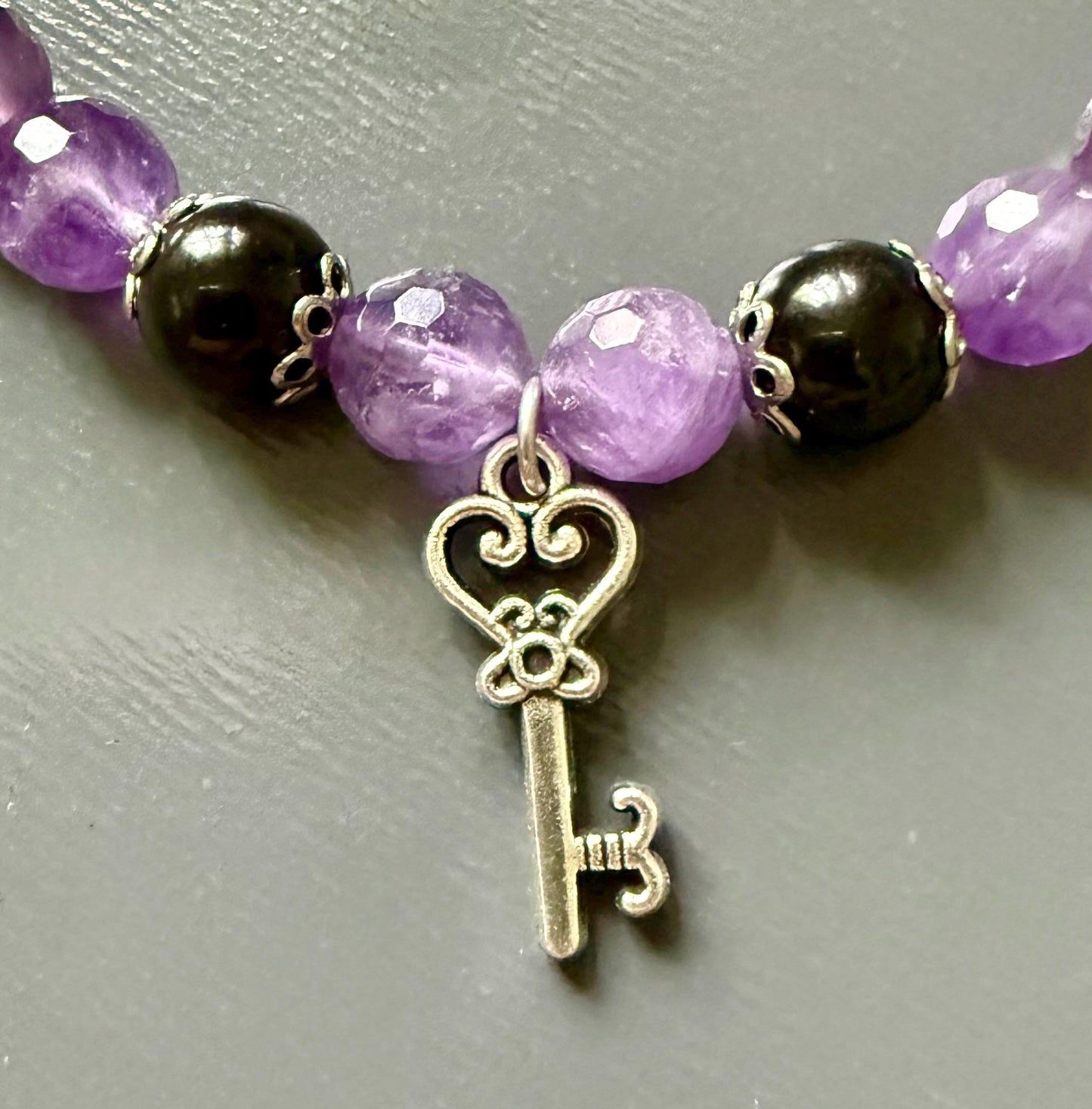 Hekate Devotional Bracelet with Amethyst and Black Obsidian Gemstones.