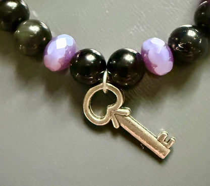 Hekate Bracelet with Black Obsidian Gemstones and Purple Iridescent Glass Beads.