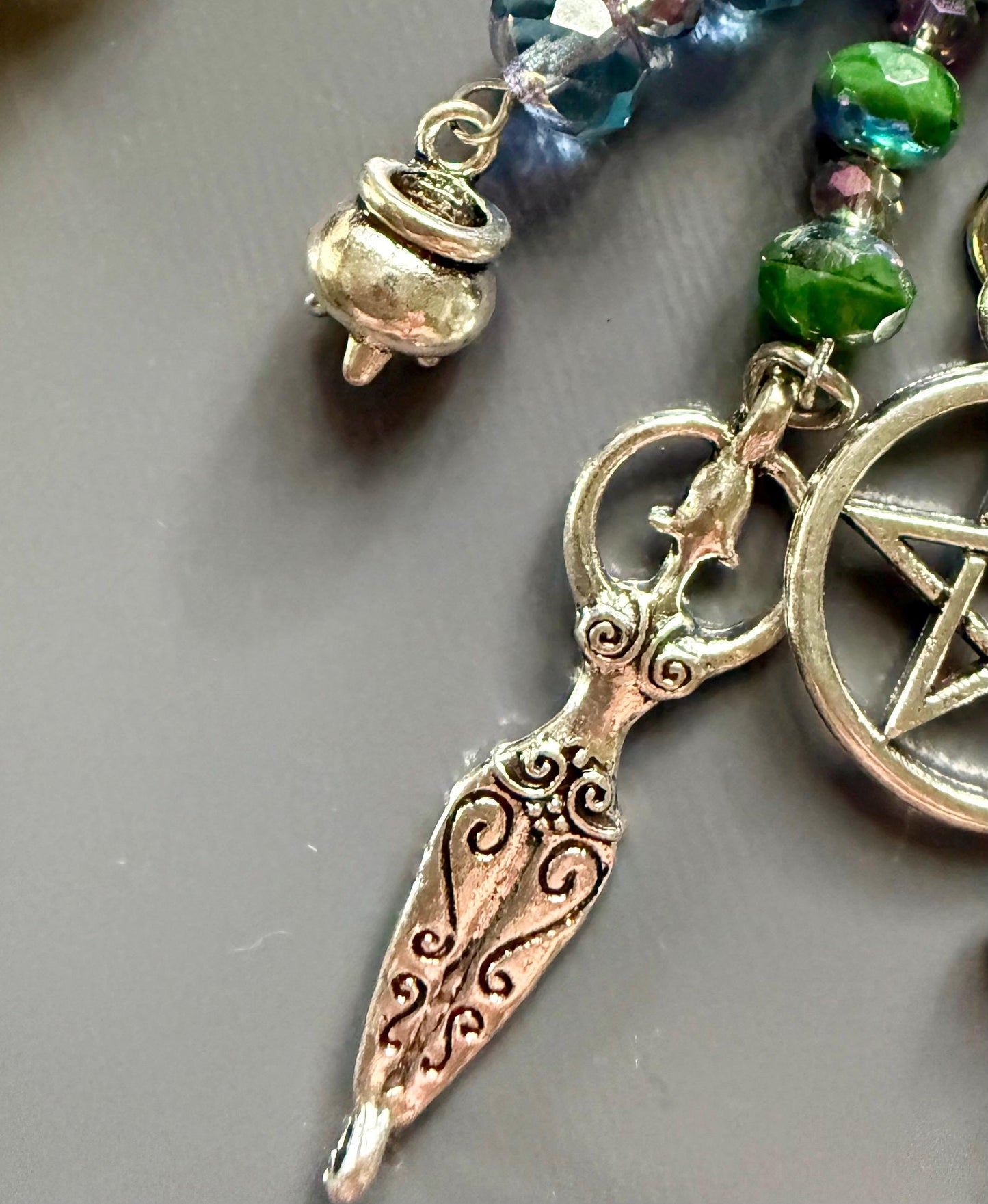 Witch Engraved Key Chain Purse Charm with Iridescent Glass Beads and Witchy Charms.