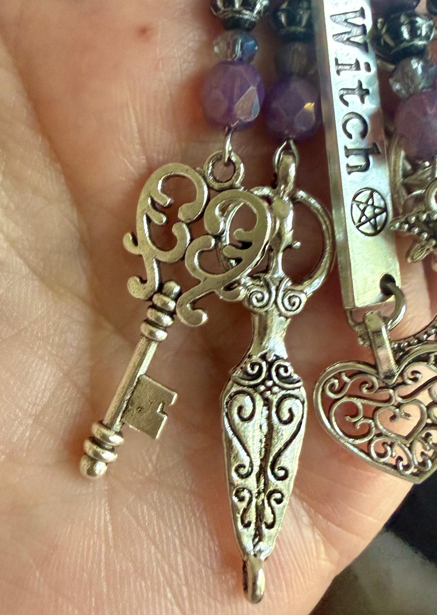 Witch Engraved Keychain Bag Charm with Iridescent Purple Beads and Witchy Charms.