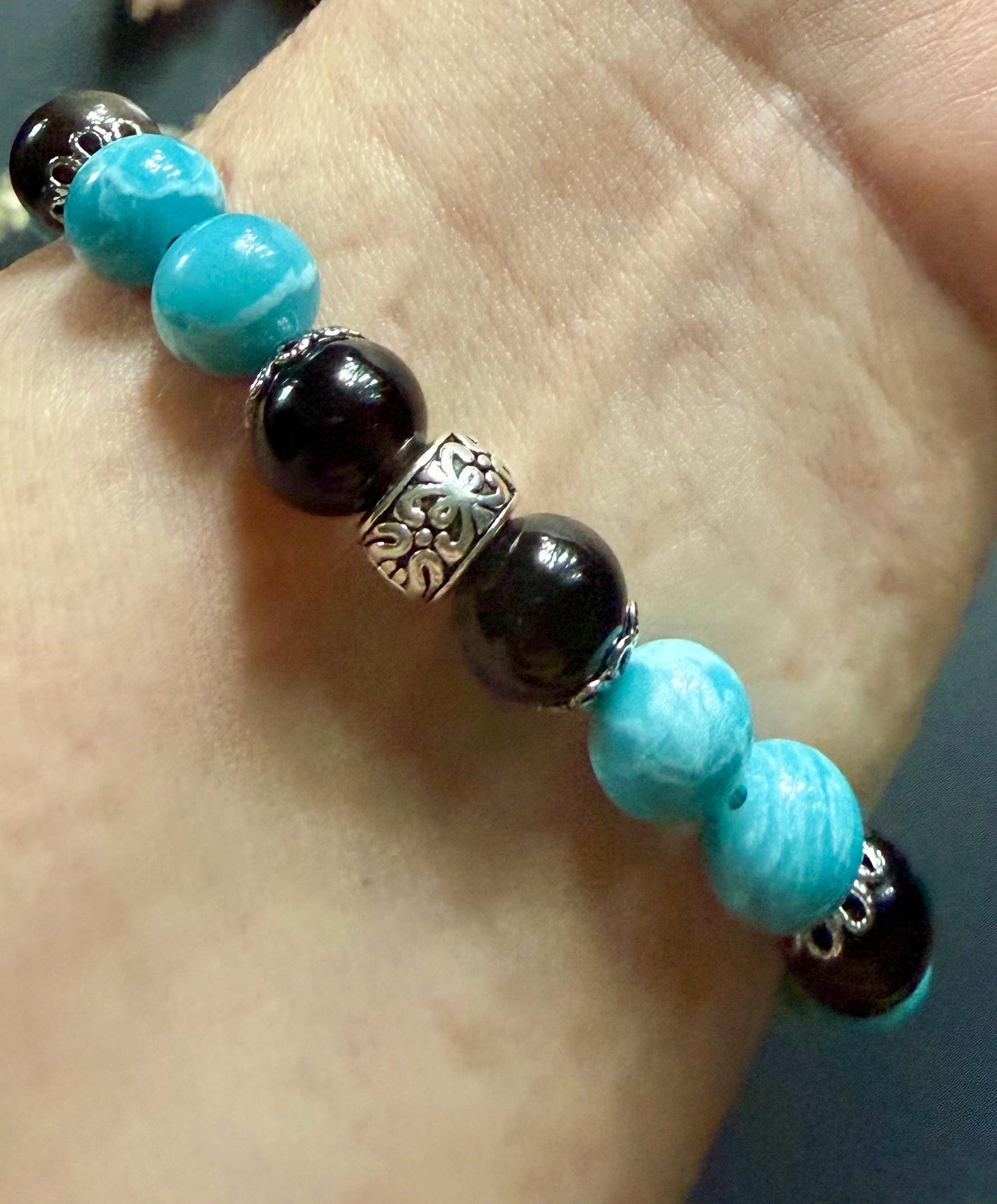 Blue Quartz and Obsidian Beaded Stretch Bracelet with Moon Phases Charm.