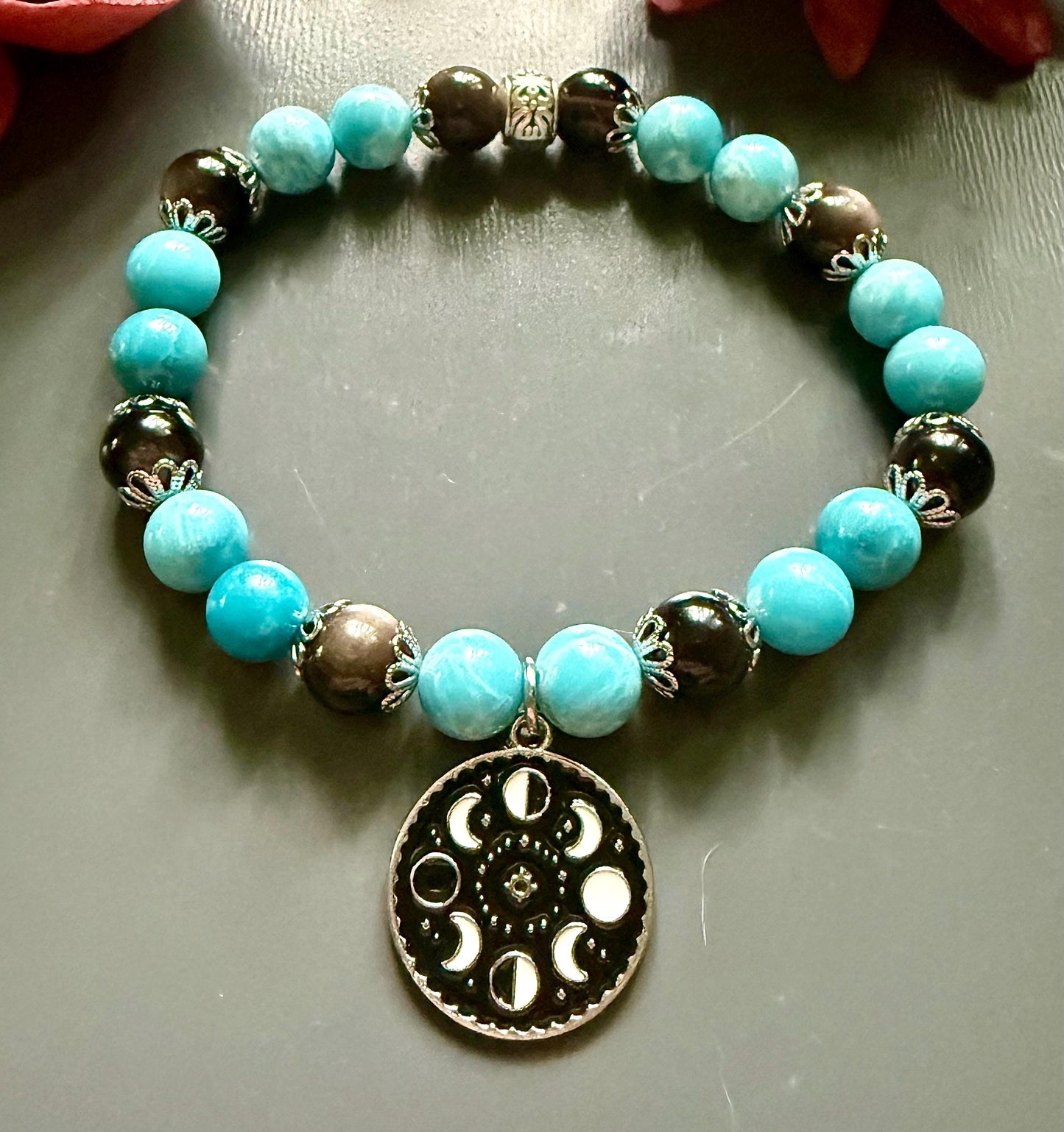 Blue Quartz and Obsidian Beaded Stretch Bracelet with Moon Phases Charm.