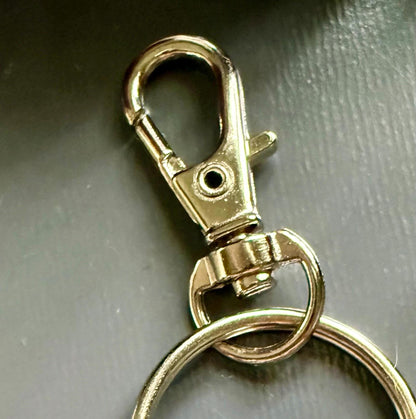 Witch Engraved Key Chain Purse Charm with Iridescent Glass Beads and Witchy Charms.