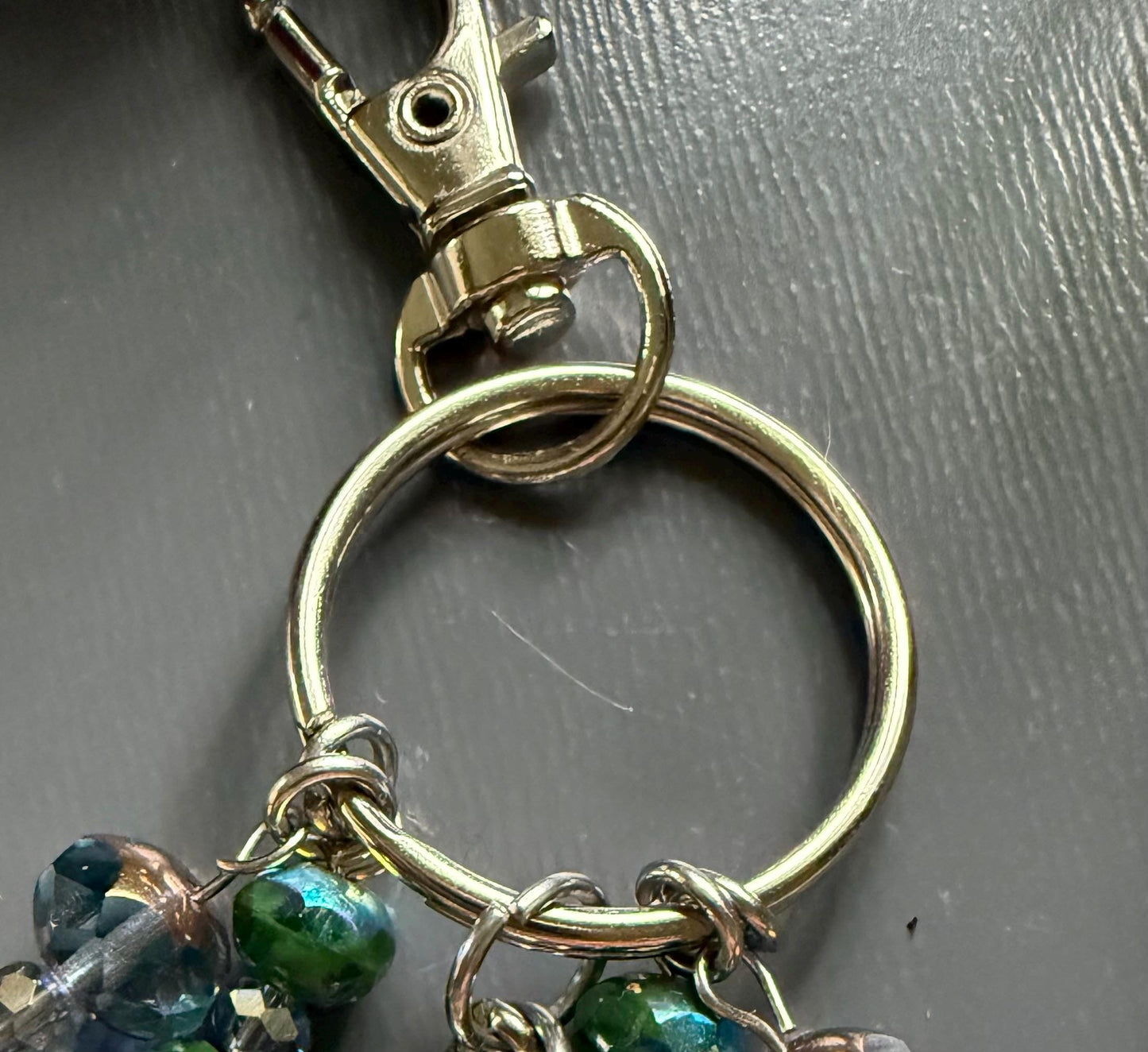 Witch Engraved Key Chain Purse Charm with Iridescent Glass Beads and Witchy Charms.