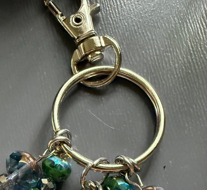 Witch Engraved Key Chain Purse Charm with Iridescent Glass Beads and Witchy Charms.