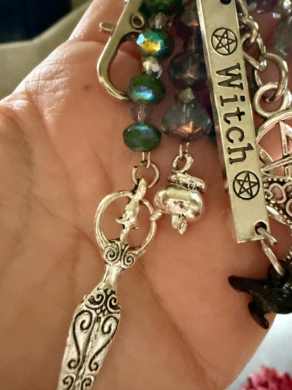 Witch Engraved Key Chain Purse Charm with Iridescent Glass Beads and Witchy Charms.