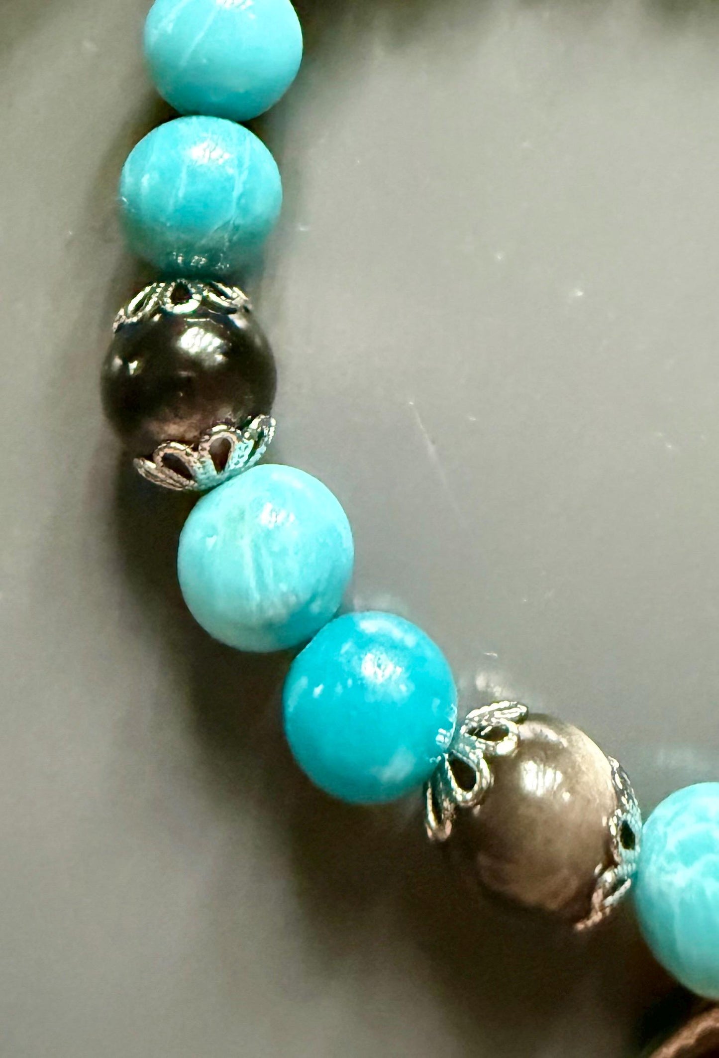 Blue Quartz and Obsidian Beaded Stretch Bracelet with Moon Phases Charm.