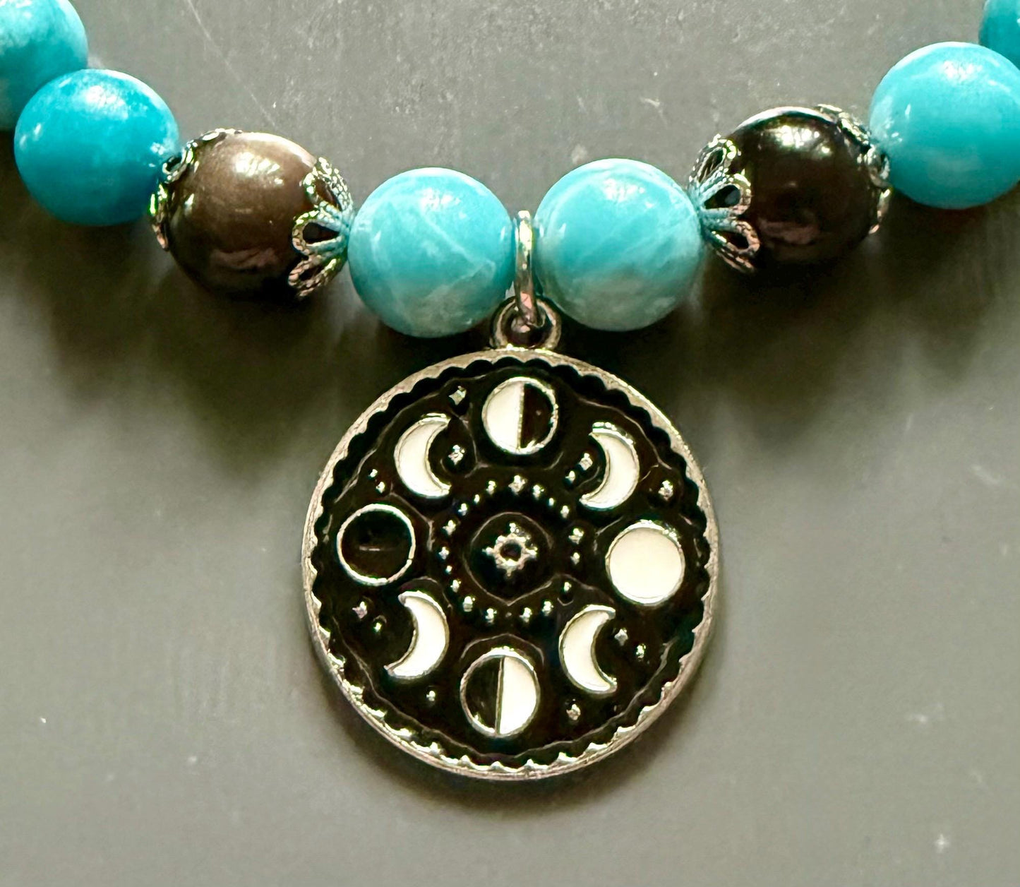 Blue Quartz and Obsidian Beaded Stretch Bracelet with Moon Phases Charm.