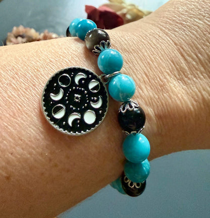 Blue Quartz and Obsidian Beaded Stretch Bracelet with Moon Phases Charm.