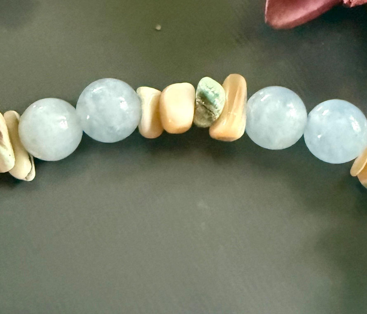 Pisces Zodiac Bracelet with Aquamarine and Shell Beads.