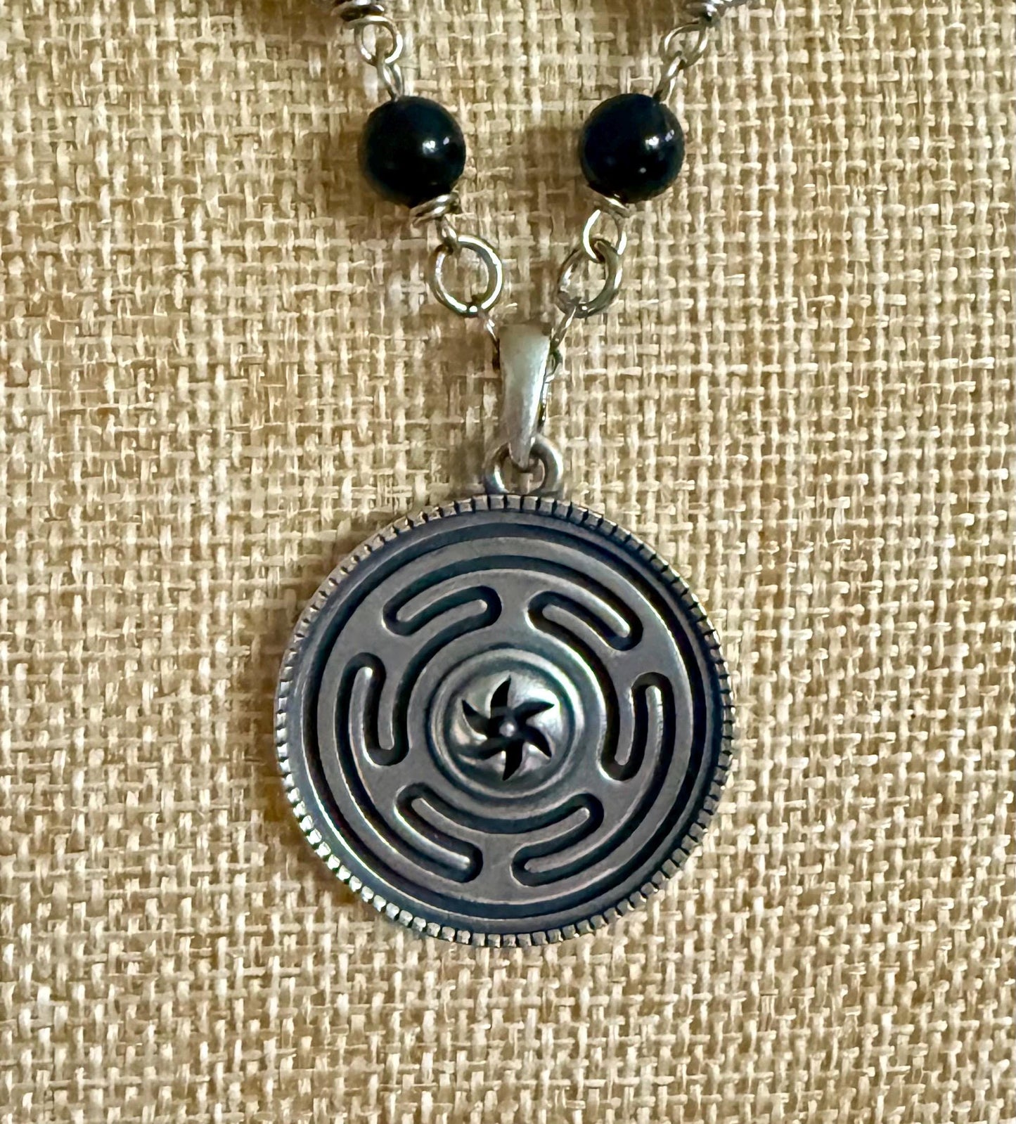 Hekate’s Wheel Strophalos Pendant Necklace with Obsidian and Moonstone Beads.