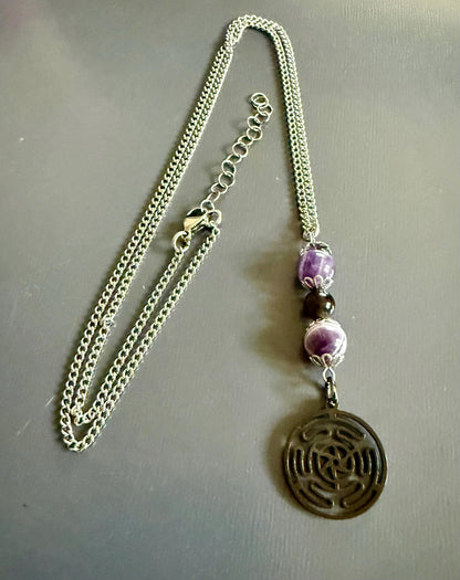 Hekate’s Wheel Strophalos Charm Necklace with Obsidian and Amethyst Beads.