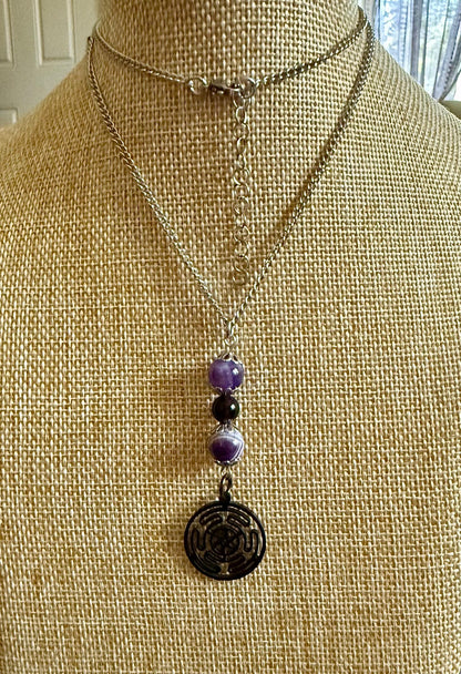 Hekate’s Wheel Strophalos Charm Necklace with Obsidian and Amethyst Beads.
