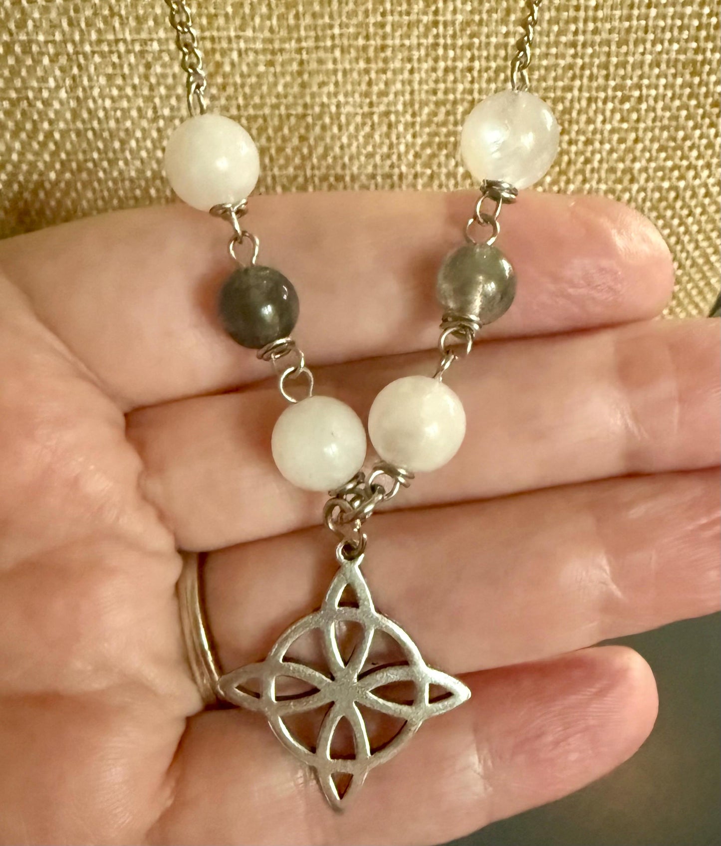 Witch’s Knot Charm Pendant Necklace with Labradorite and Moonstone Beads.