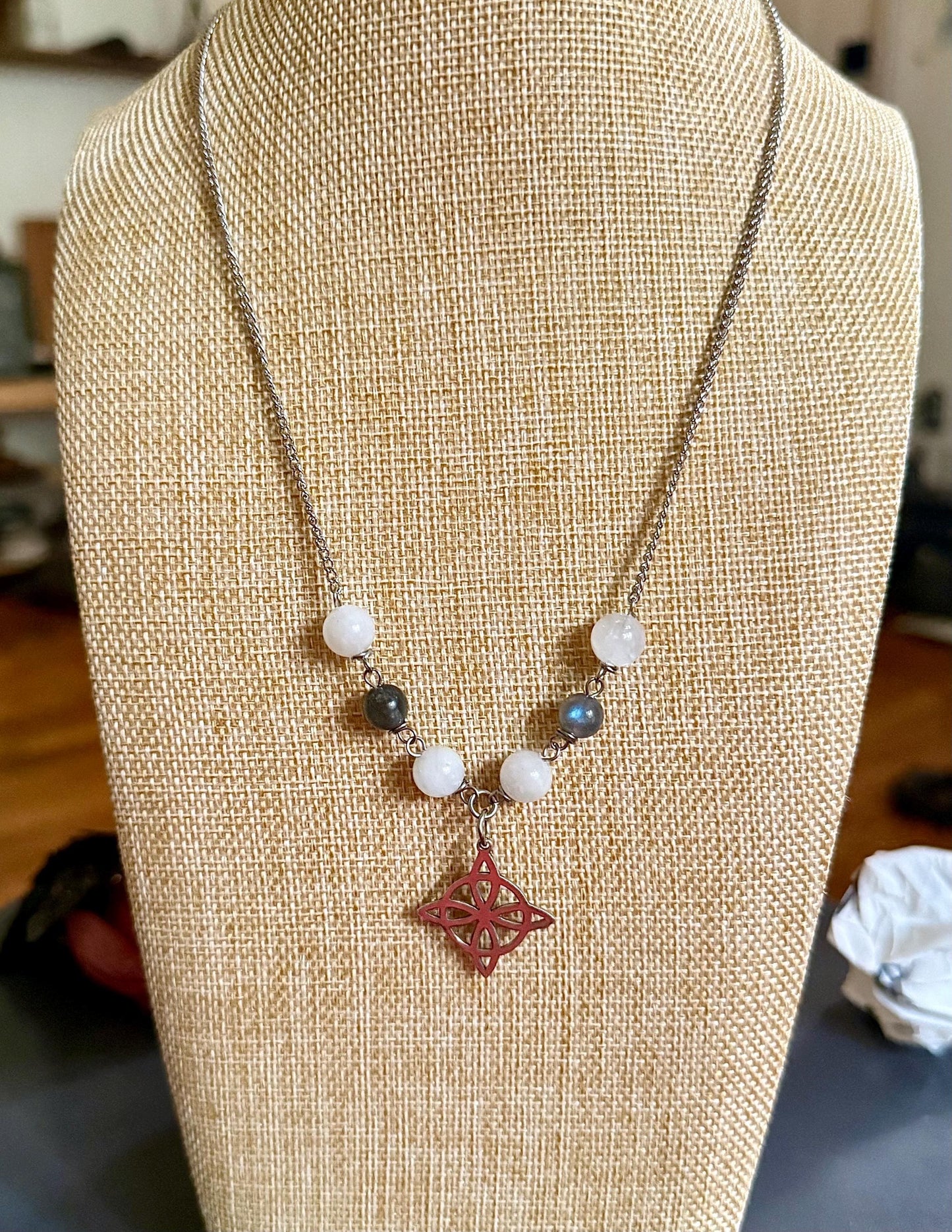 Witch’s Knot Charm Pendant Necklace with Labradorite and Moonstone Beads.