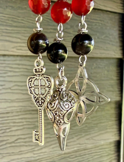 Witchy Car Charm Accessory:  Carnelian, Obsidian Beads with Crow Skull, Witch’s Knot, and Key Charms.