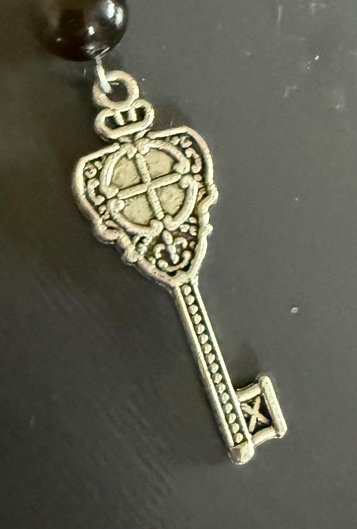 Witchy Car Charm Accessory:  Carnelian, Obsidian Beads with Crow Skull, Witch’s Knot, and Key Charms.