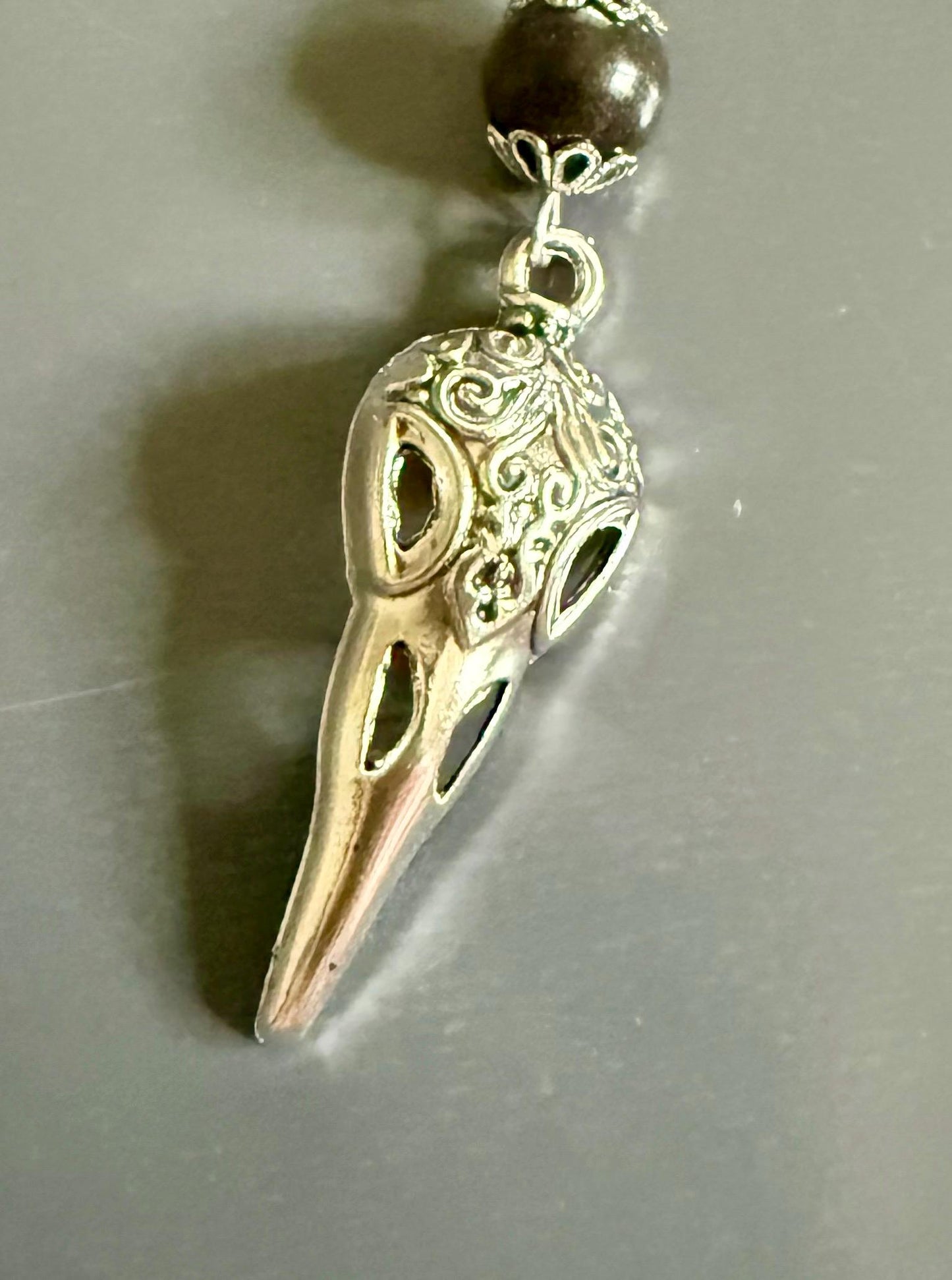 Morrigan Celtic Goddess Prayer Beads: Carnelian, Moss Agate, Obsidian, Crow Skull, and Triquetra Charm.