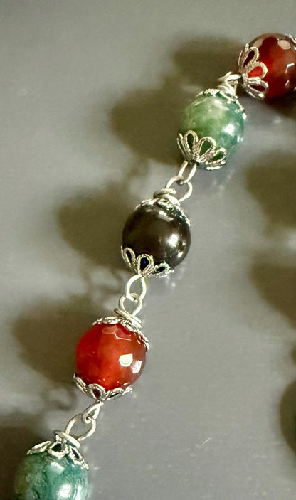 Morrigan Celtic Goddess Prayer Beads: Carnelian, Moss Agate, Obsidian, Crow Skull, and Triquetra Charm.