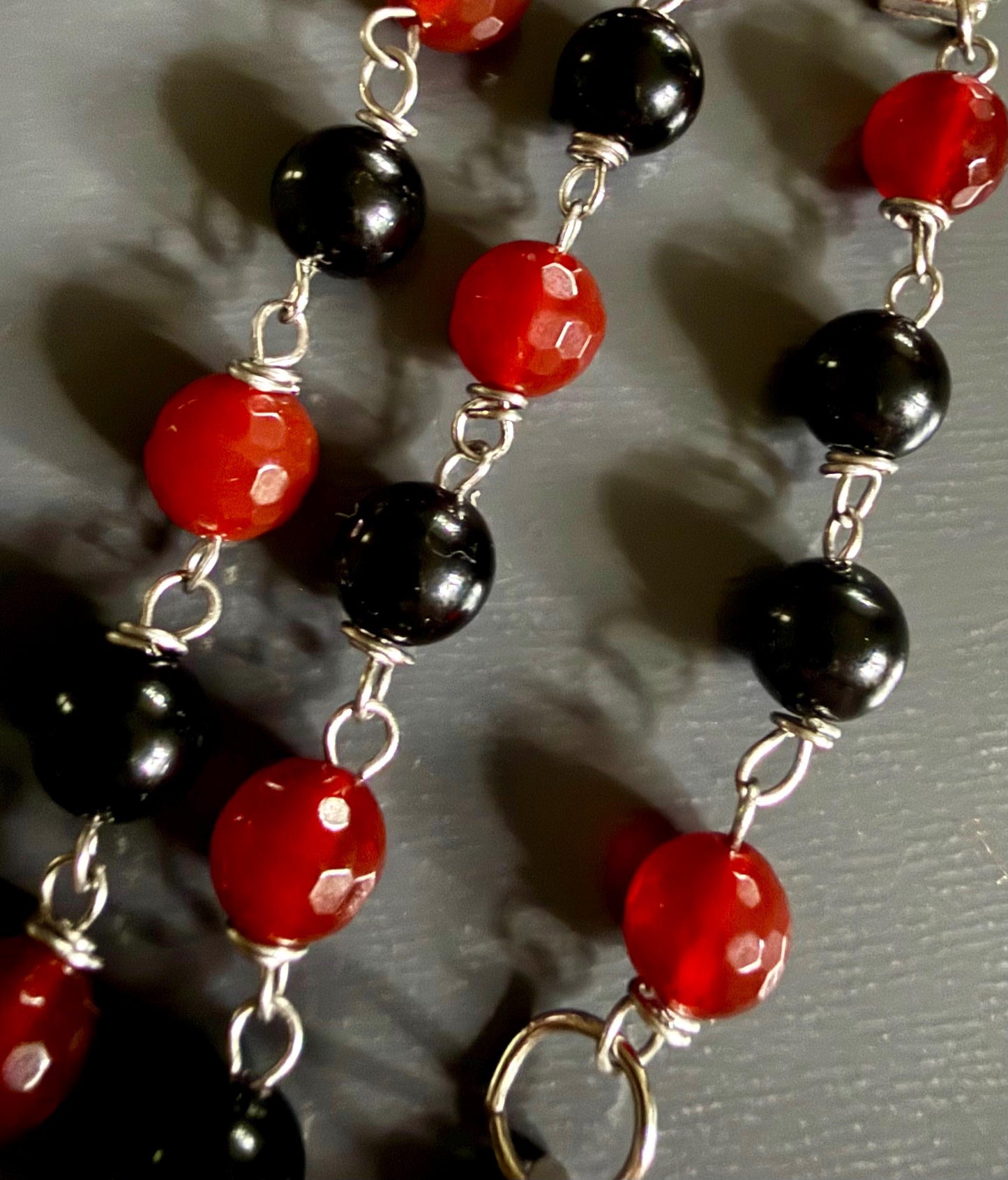 Witch’s Rosary with Carnelian, Obsidian, and Raven Charm.