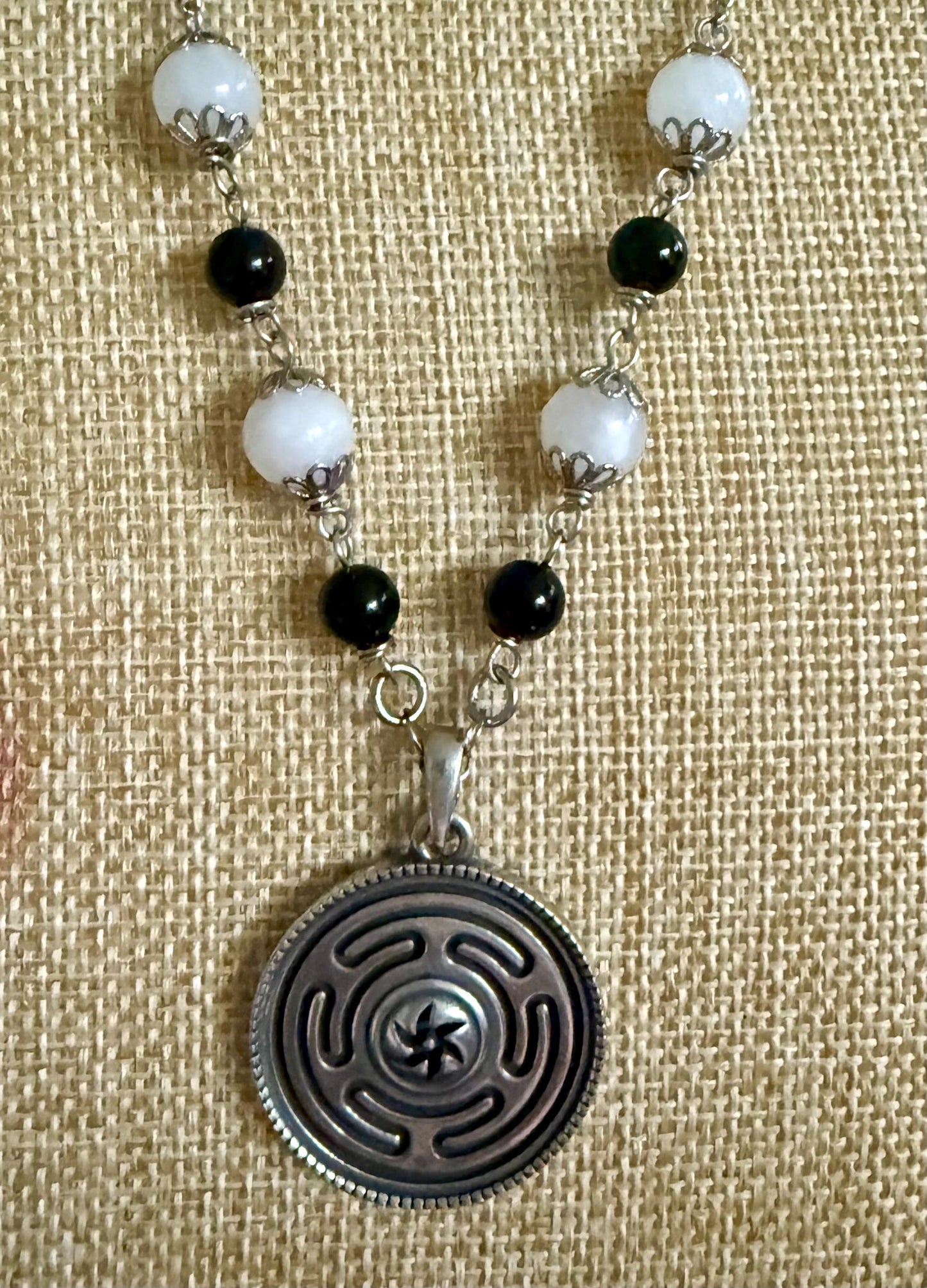 Hekate’s Wheel Strophalos Pendant Necklace with Obsidian and Moonstone Beads.