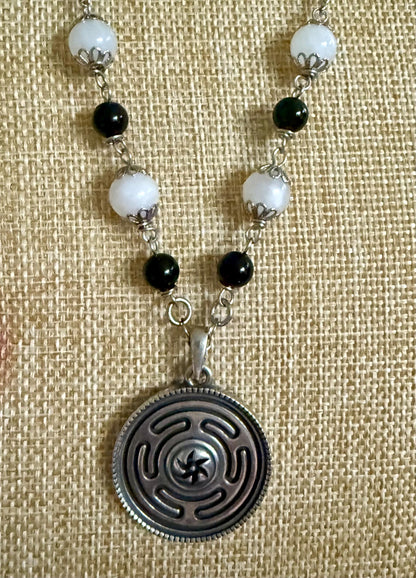 Hekate’s Wheel Strophalos Pendant Necklace with Obsidian and Moonstone Beads.