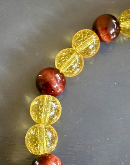 Leo Zodiac Charm Bracelet with Citrine and Red Tiger’s Eye Beads.