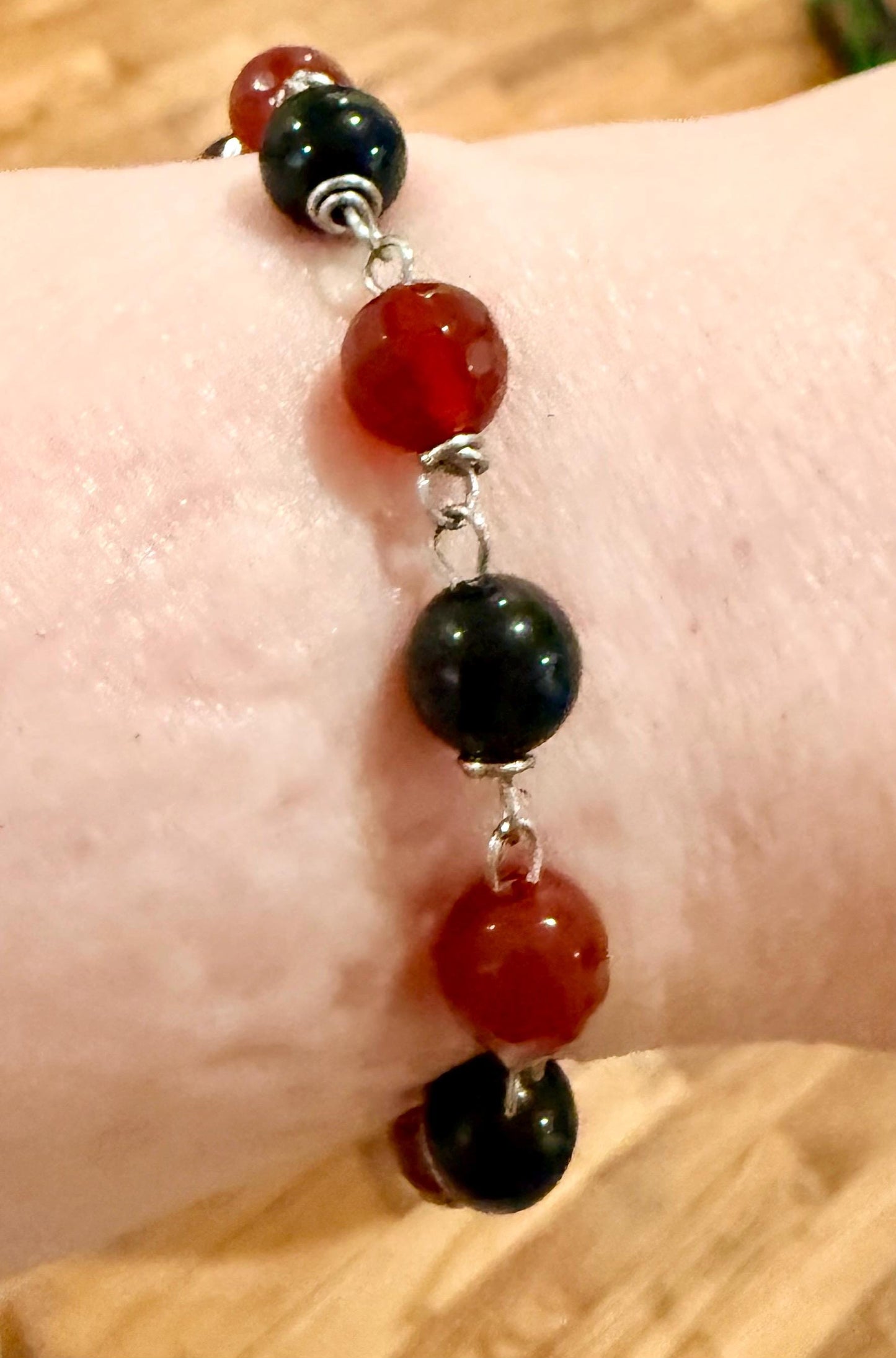 Witch’s Rosary with Carnelian, Obsidian, and Raven Charm.