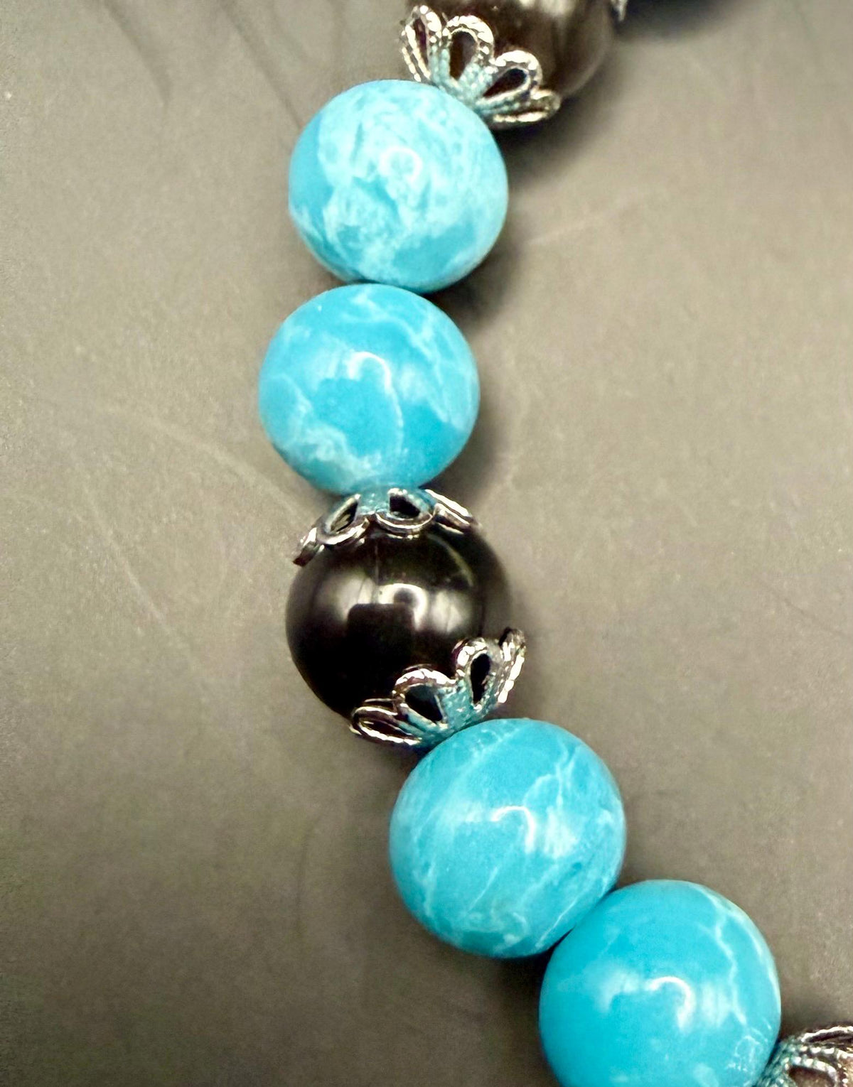Blue Quartz and Obsidian Beaded Stretch Bracelet with Moon Phases Charm.