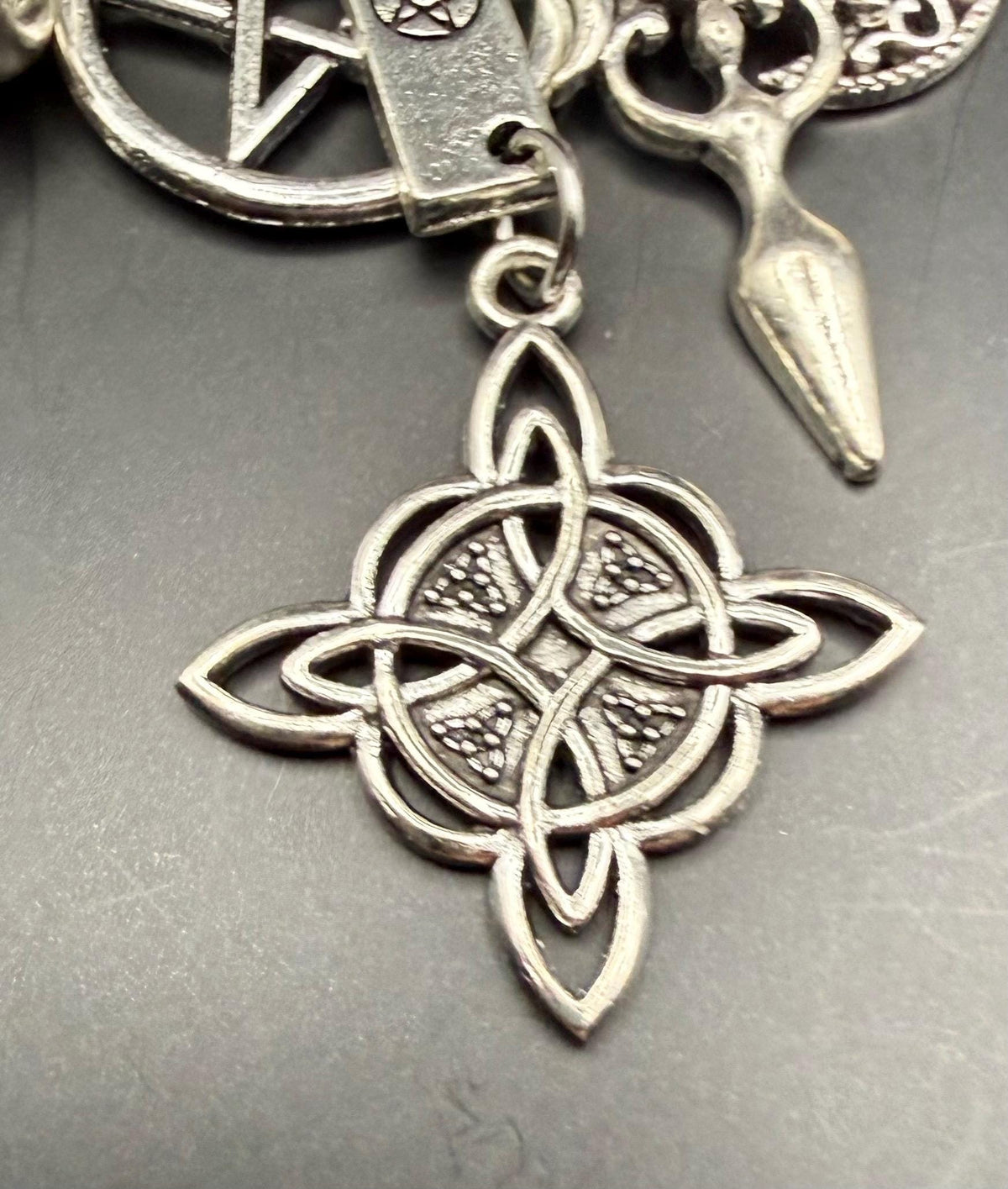 Witch Engraved Key Chain Bag Charm with Iridescent Glass Beads and Witchy Charms.