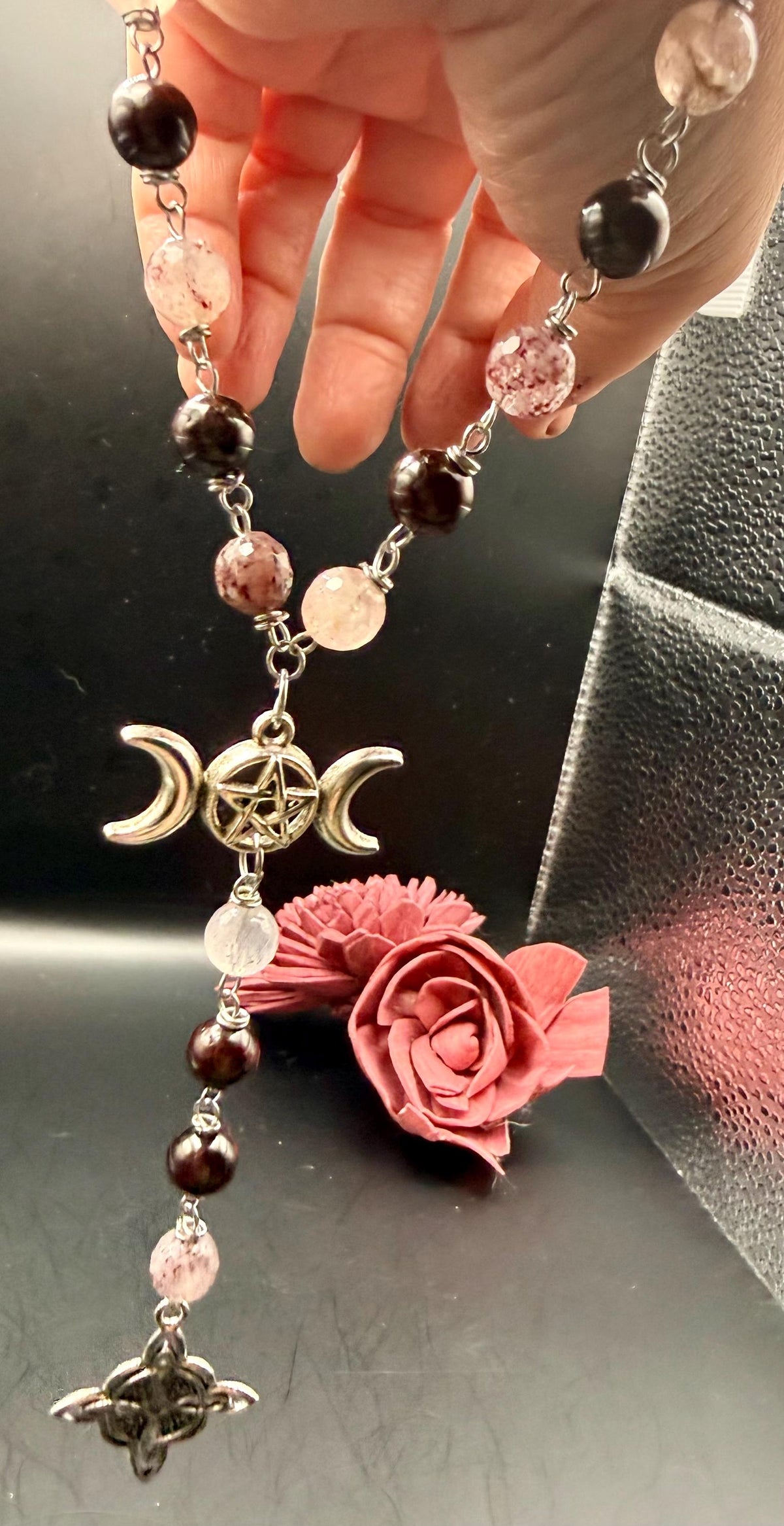 Witch’s Rosary: Strawberry Quartz, Garnet, Triple Moon, and Witch’s Knot Charm.