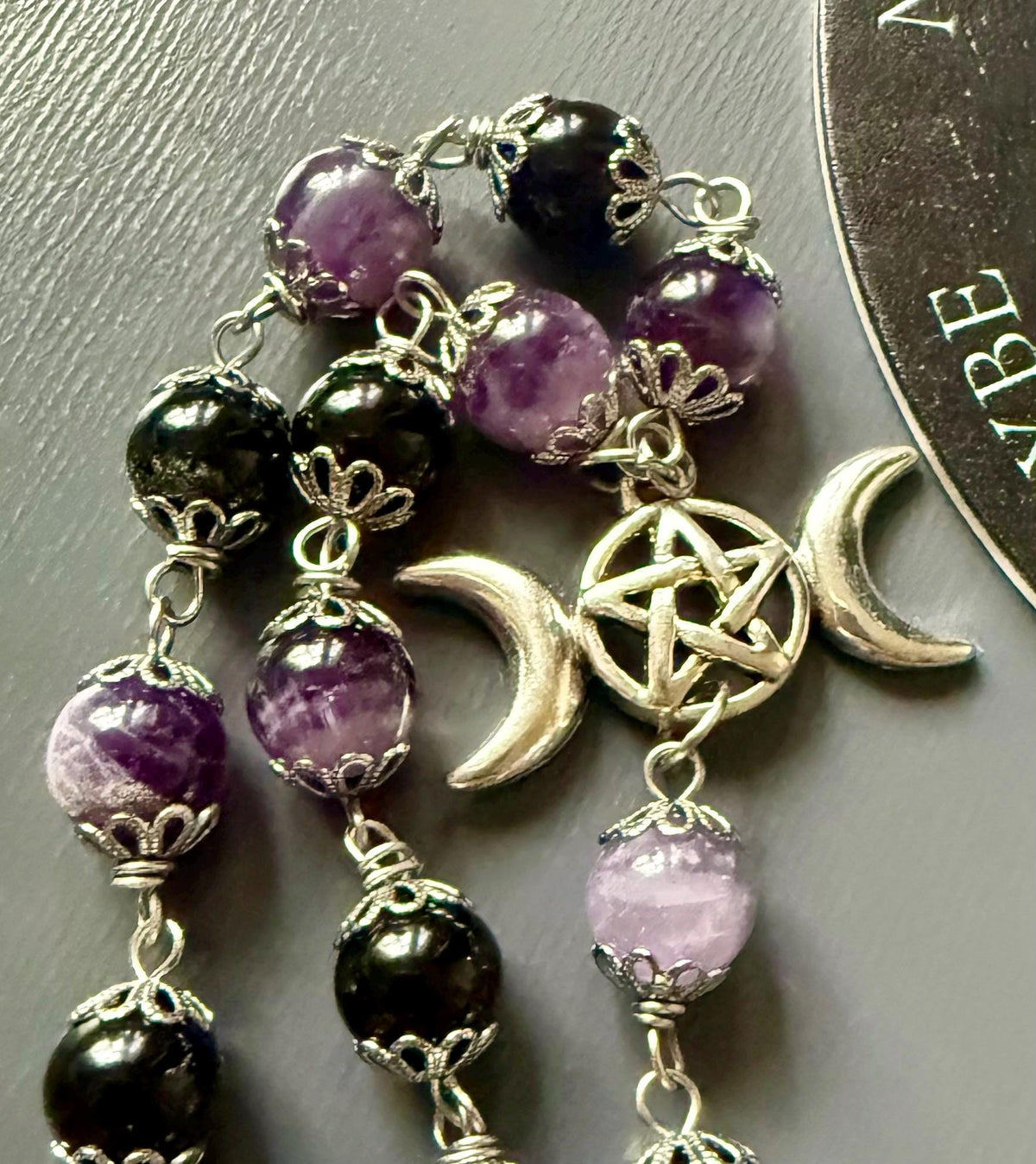 Goddess Hekate Devotional Altar Bundle with Witch’s Rosary, Pendulum , and Black Beeswax Pillar Candle.