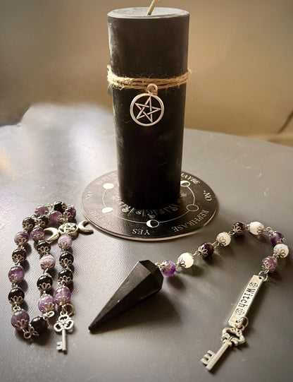Goddess Hekate Devotional Altar Bundle with Witch’s Rosary, Pendulum , and Black Beeswax Pillar Candle.