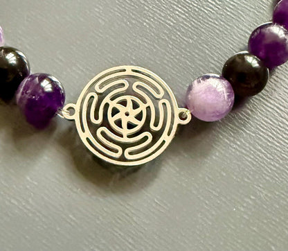 Hekate’s Wheel Strophalos Devotional Bracelet with Amethyst and Black Obsidian Gemstones.