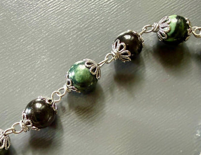 Handmade Kambaba Jasper Point Pendulum with Obsidian Beads.