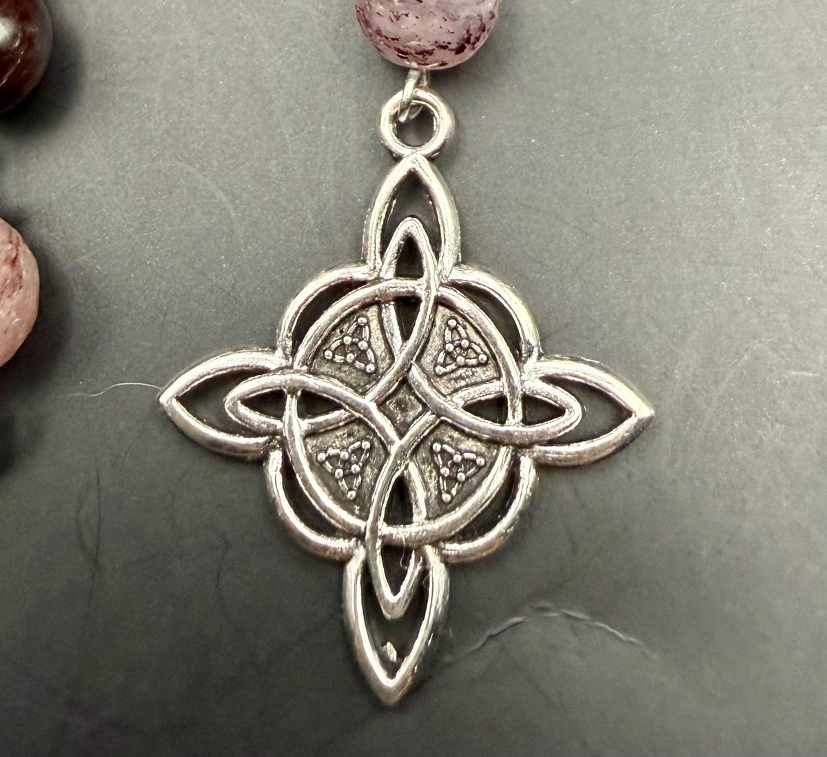 Witch’s Rosary: Strawberry Quartz, Garnet, Triple Moon, and Witch’s Knot Charm.