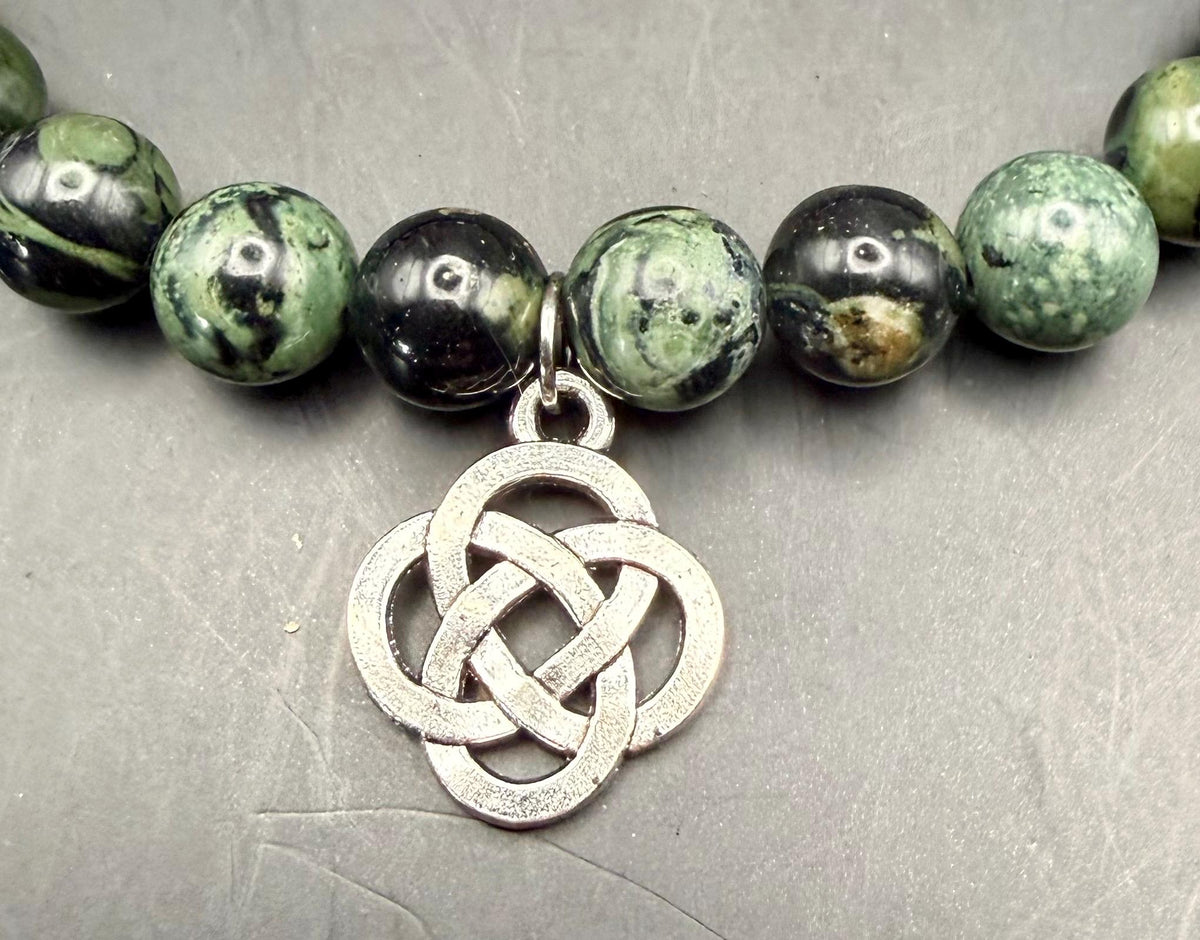 Kambaba Jasper Gemstone Stretch Bracelet with Celtic Knot Charm.