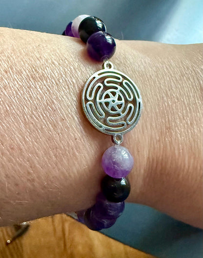 Hekate’s Wheel Strophalos Devotional Bracelet with Amethyst and Black Obsidian Gemstones.