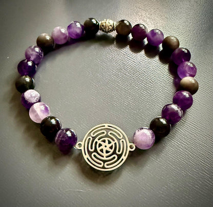Hekate’s Wheel Strophalos Devotional Bracelet with Amethyst and Black Obsidian Gemstones.