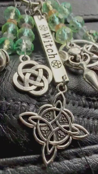 Witch Engraved Key Chain Bag Charm with Iridescent Glass Beads and Witchy Charms.