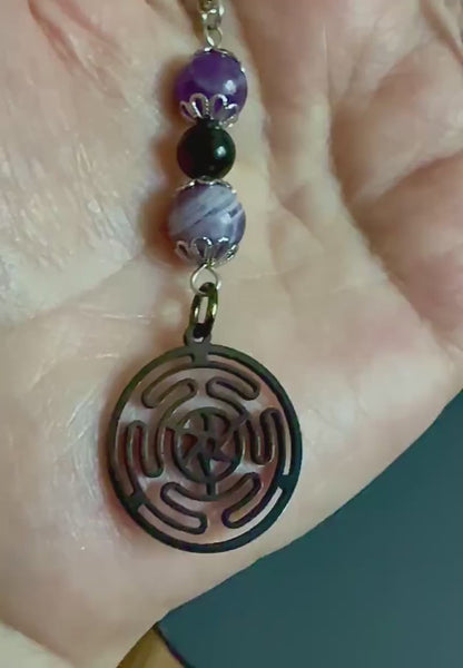 Hekate’s Wheel Strophalos Charm Necklace with Obsidian and Amethyst Beads.