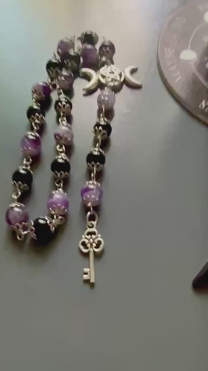 Goddess Hekate Devotional Altar Bundle with Witch’s Rosary, Pendulum , and Black Beeswax Pillar Candle.