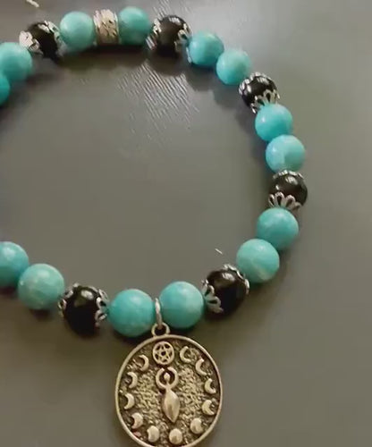 Blue Quartz and Obsidian Beaded Stretch Bracelet with Moon Goddess Charm.