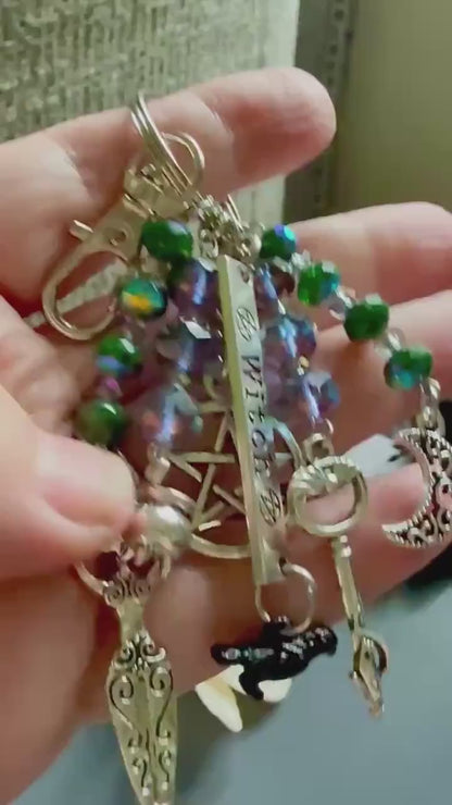 Witch Engraved Key Chain Purse Charm with Iridescent Glass Beads and Witchy Charms.