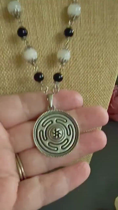 Hekate’s Wheel Strophalos Pendant Necklace with Obsidian and Moonstone Beads.